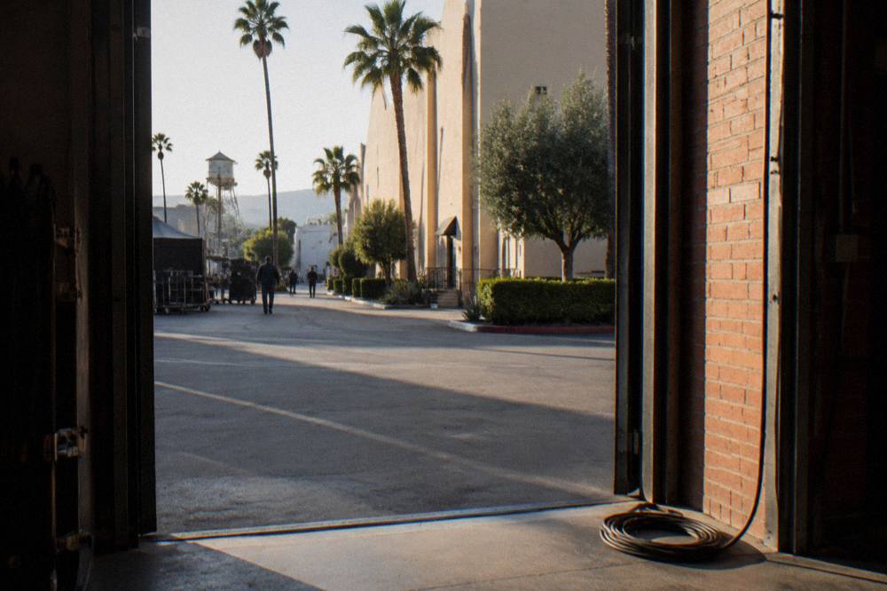 Historic studio soundstage exterior on a Culver City lot with stage doors open