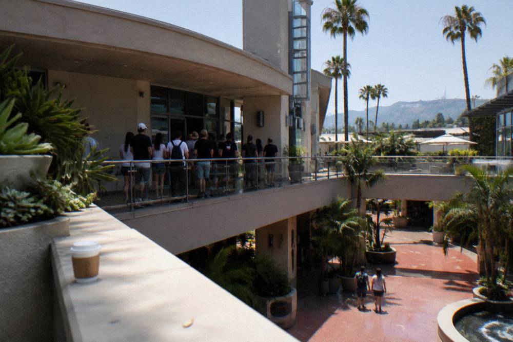 A viewpoint over Hollywood with the sign on the distant ridge and city streets below