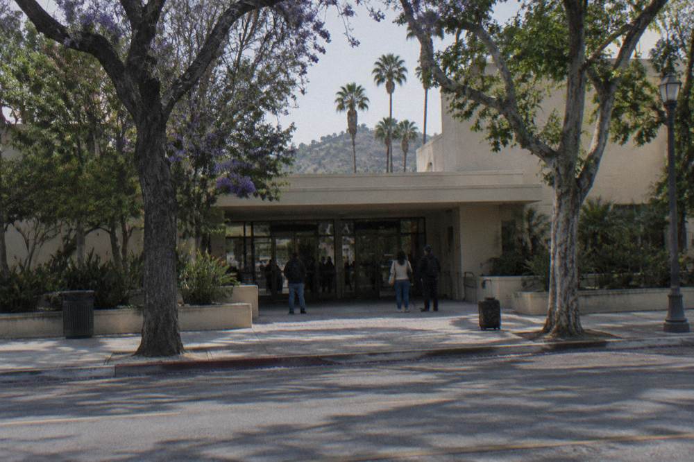 Studio tour center entrance sign on Melrose Avenue on a bright morning